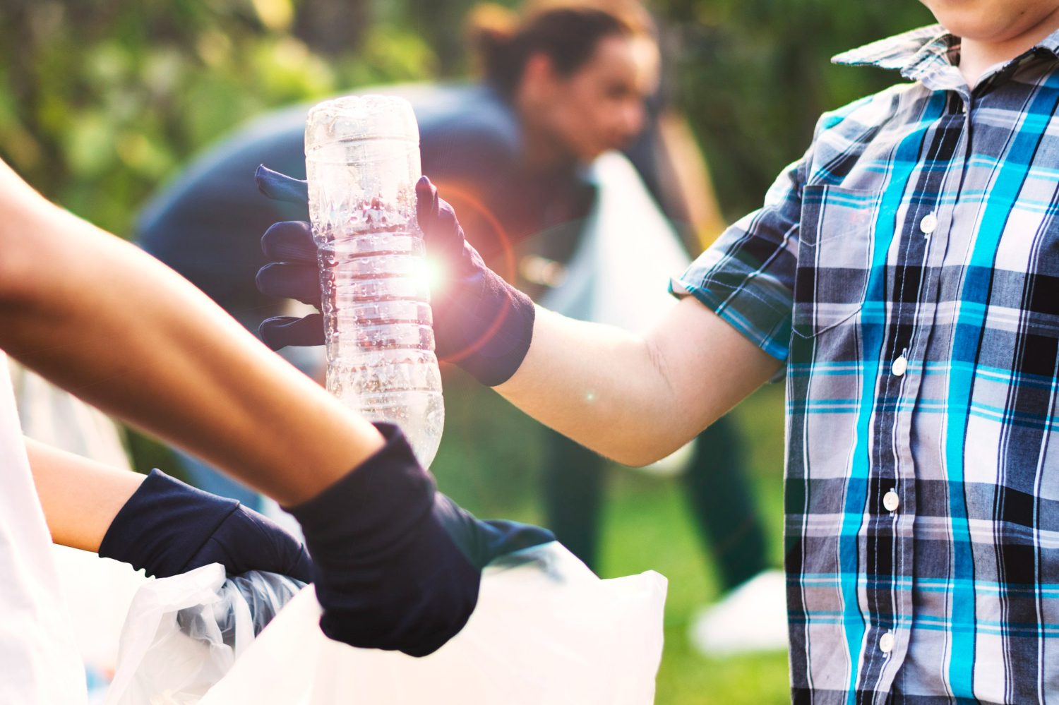 photo environmentalist recycling plastic bottle for earth day